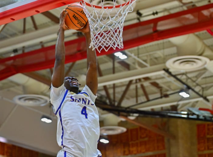 Jurian Dixon (4) was a menace on the offensive boards for the San Diego Section Open champions. Photo: Justin Fine.